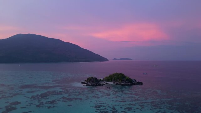 Koh Lipe, Thailand: Aerial drone footage of islets in Koh Lipe, an island in Andaman sea of Thailand. Taken with orbit motion on beautiful sunset