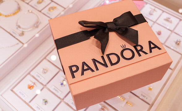 Braunschweig, Germany - March 28, 2026: Elegant Pandora gift box with brand logo and satin ribbon on boutique display, marketing concepts, anniversaries, Mother's Day, premium jewelry collections