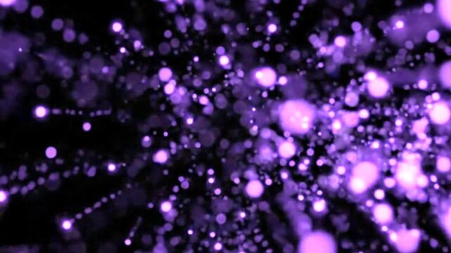 Explosion of vibrant purple glitter particles on a black background. Cinematic motion with glowing dust trails and bokeh effects, perfect for celebratory and abstract commercial backgrounds