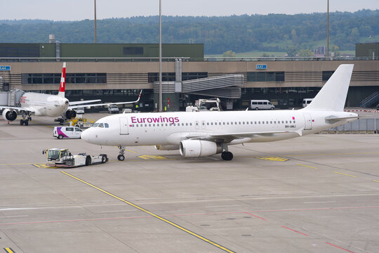 Avion Express passenger airplane type Airbus A320-232 registration 9H-AMJ pushback at Swiss Z&uuml;rich Airport on a cloudy autumn day. Photo taken October 3rd, 2025, Zurich Airport, Switzerland.