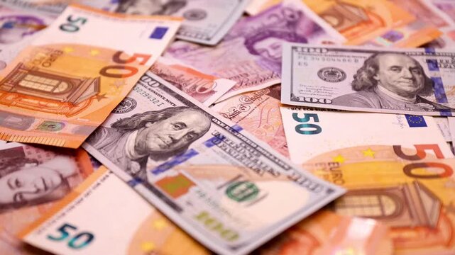 Money background with many British pound, US dollars and Euro banknotes