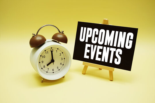 Upcoming Events text message and alarm clock on yellow background