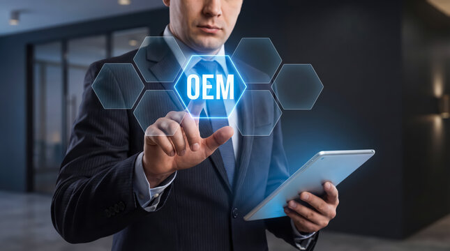 Businessman touching a virtual interface with the acronym oem, representing original equipment manufacturer concept