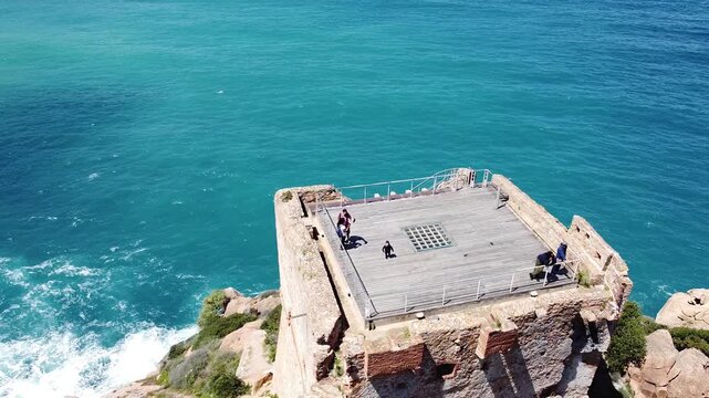 Aerial view of the Genoese tower and red cliffs in Porto Ota, Corsica France