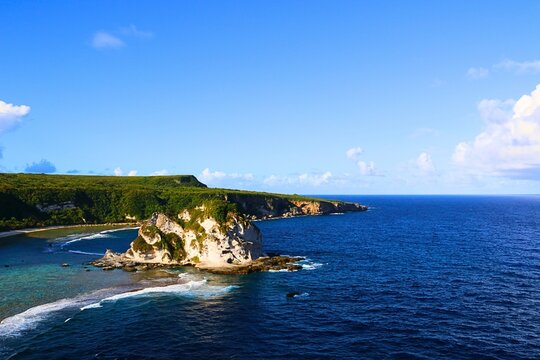 Paradise Tropical Beach with Blue Sky and White Clouds