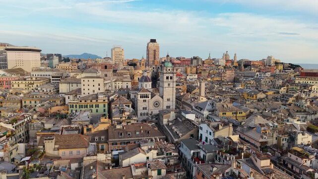 Aerial Dolly Shot of Genoa Porto Antico at Sunset, Italian historic city cityscape, Italy