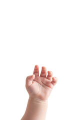 Obraz premium macro shot of a delicate, pale infant hand reaching forward, soft diffused light emphasizes plump skin on a high-key white background with copy space. concept of fragility and innocence