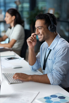 Computer, consulting and headset with man in call center for assistance, feedback or virtual help. Communication, contact us and support with agent in customer service for problem solving or solution