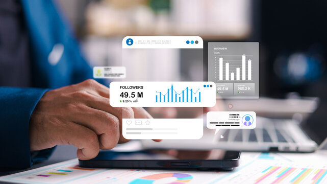 Business professional using smartphone with virtual dashboard, analyzing social media metrics and data for digital marketing strategy and growth.