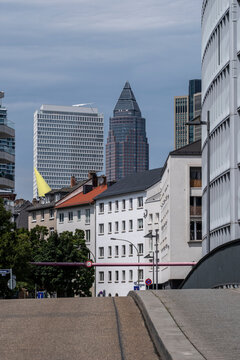 City street view in bankenviertel frankfurt germany using perspective as office tower architecture frames the skyline above quiet sidewalks