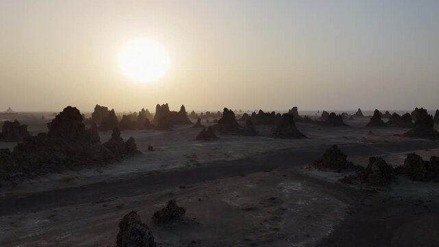 Drone view of rocky desert landscape with scattered formations near the Red Sea, wide aerial footage.