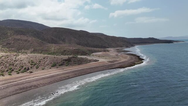 Drone view of Djibouti coastline with scenic Red Sea and natural terrain, wide aerial footage.