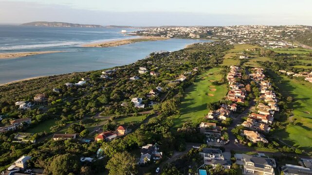 Plettenberg Bay Goose Valley golf course at sunrise with aerial view of lagoon