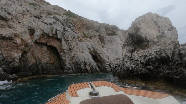 First Person POV Motorboat Sailing Toward Cliffs Souda Bay Chania Crete Greece