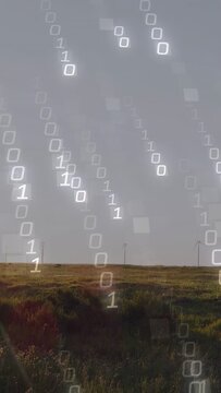 Vertical video: Sun glare sparking binary columns falling over sky, showing data flow across plains