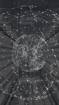 Vertical video: On input particle globe forming pulsing settling showing tech nodes in atrium