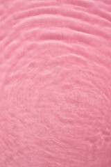 Fototapeta premium Pink ripple water background, creative modern blur wallpaper idea.