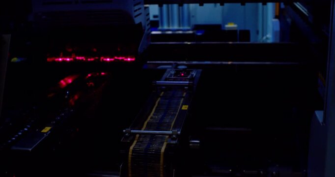  Modern hi-tech production. Electronic circuit boards production and installation of SMD components. Special equipment diagnose and test chips and processors. Manufacture of electronic chips. Close-up