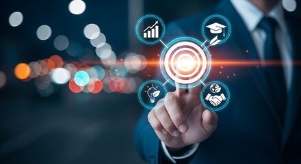 Fototapeta premium Businessman pressing virtual target button with education and finance