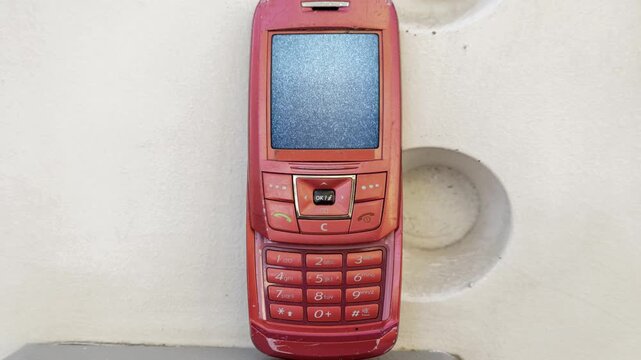 mobile telephone stop motion in urban settings with glitch on screen