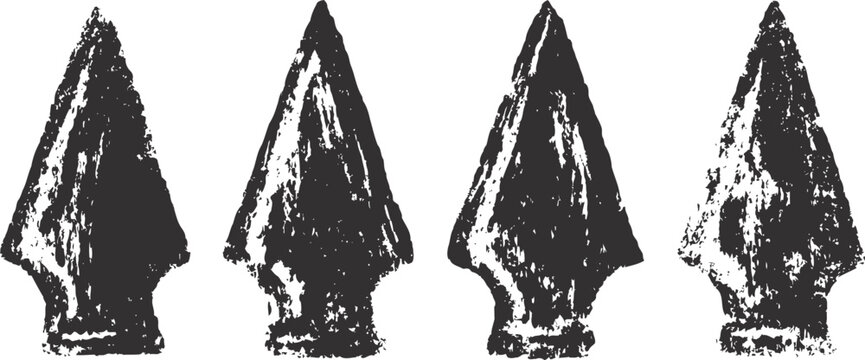 Ancient arrowheads collection four stone spear tips with rough textures prehistoric tools and artifacts from early human history