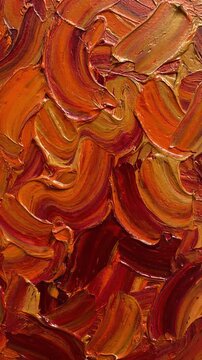 Oil painting with thick textured brushstrokes of orange and red pigment. Abstract impasto background created with palette knife showing dynamic artistic layering.