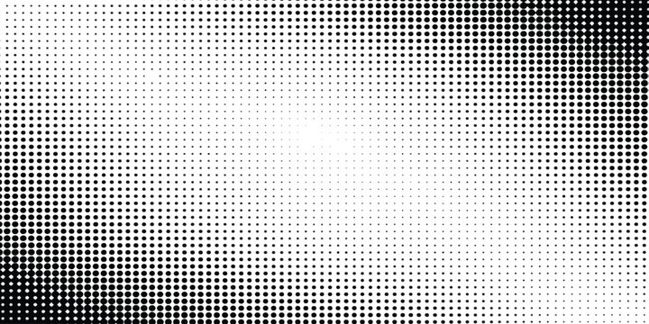 Abstract black and white halftone dot pattern texture with a central light space for copy