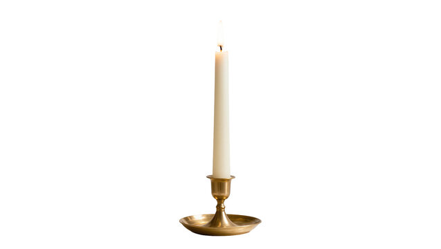 Tall cream candle burning with a small flame in a brass candlestick holder, isolated on transparent background