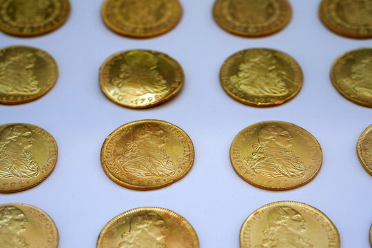 Gold escudos from the Spanish colonial era, minted in Mexico during the reign of Charles IV