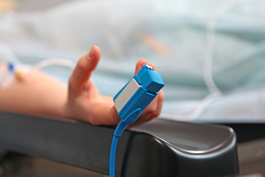 Sensor for measuring blood oxygen levels. Pulse oximeter for monitoring blood oxygen levels and pulse rate. Close-up. Photo in the operating room.