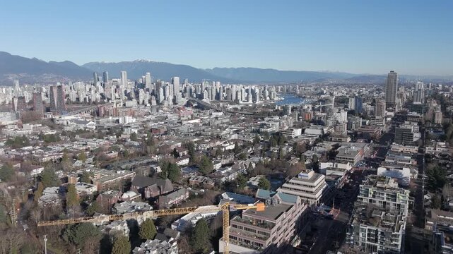 Residential Areas And Commercial Streets At Kitsilano Neighborhood In Vancouver, British Columbia, Canada. Aerial Drone Shot