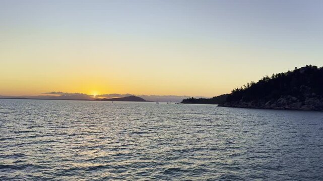 Vehicle and passenger ferry departing from Nelly Bay Harbour on Magnetic Island to Townsville, Queensland, Australia. Coastal transport, travel and maritime connection.