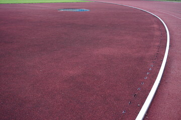 Running track curve with a shot put circle on a stadium field © RifaldiMuhammadSalim