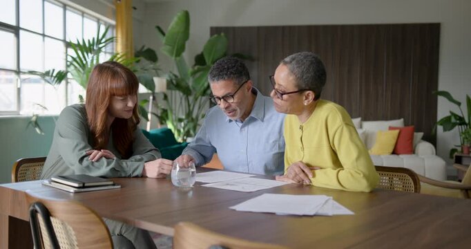 Senior Couple Meeting with financial advisor to discuss finances