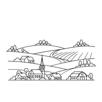 Rural village landscape with church and houses in rolling hills