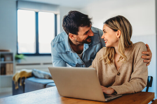 Online entertainment and social media. Diverse, multiethnic couple enjoying the digital world