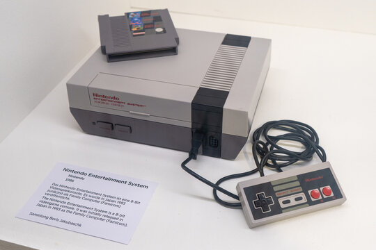 Karlsruhe, Germany - 4 May 24: Nintendo Entertainment System console with controller and cartridge