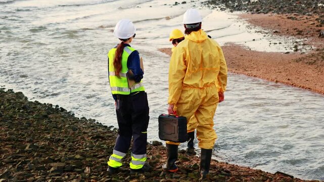Female employee led team male officers in inspecting water pollution by collecting samples treated water discharged from the refinery into the sea test toxic contaminants that could cause pollution