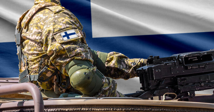 Finland flag with soldier at machinegun turret