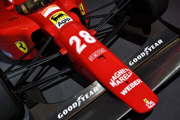 Fototapeta premium Scarperia, Italy - October 24th 2025: Ferrari 642 or F1-91 ex Alain Prost and Jean Alesi on display during Ferrari World Finals 2025 at Mugello Circuit in Italy.
