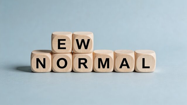 New Normal concept wooden cubes with letter alphabet on blue background changing life situation adaptation to modern world social issue during pandemic