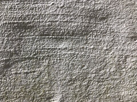 Gray cracked concrete old cement stone wall texture wallpaper background