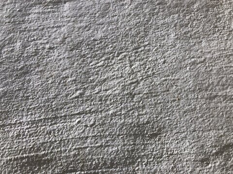 Gray cracked concrete old cement stone wall texture wallpaper background