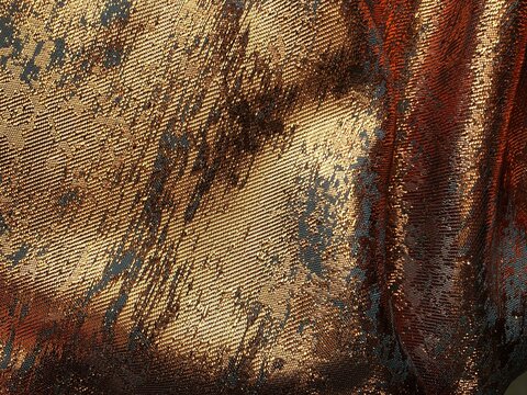 Luxury copper, bronze, red gold metallic fabric texture elegant draped folds shimmer, distressed foil effect