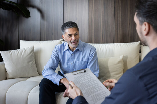 Senior man consulting with a financial advisor