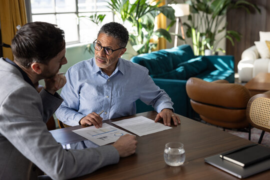 Professional businessmen engaged in a collaborative meeting