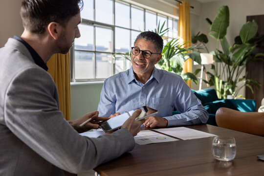 Business professionals engaged in lively dialogue
