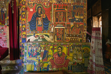 Fototapeta premium Traditional Ethiopian Orthodox iconography painted on a wall in the Ura Kidane Mehret church