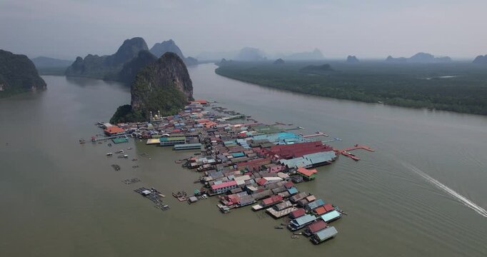 Aerial view of Koh Panyee (or Koh Panyi) floating fishing village built on stilts, Phang Nga Bay, Thailand.