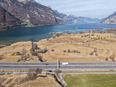 Drone view at the Lake of Four Cantons near Seedorf on the Swiss alps